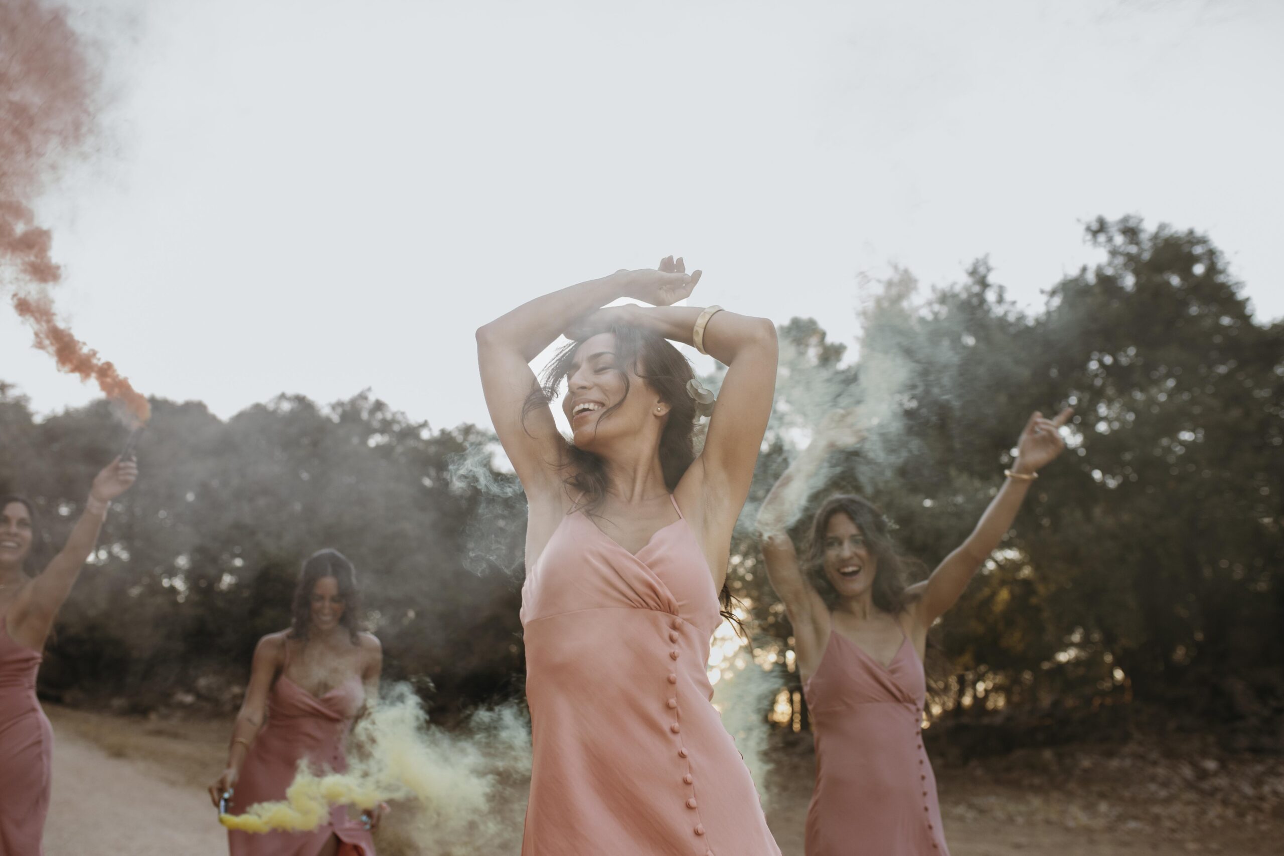 bridesmaids-pretty-dresses-celebrating-wedding-outdoors