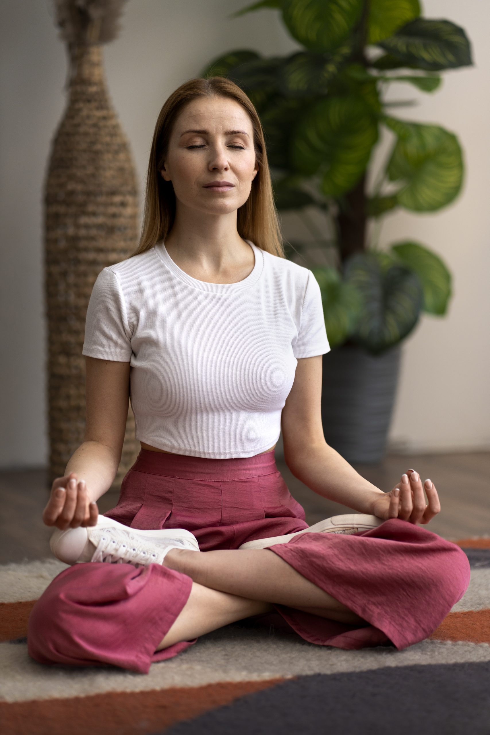 person-practicing-tai-chi-indoors